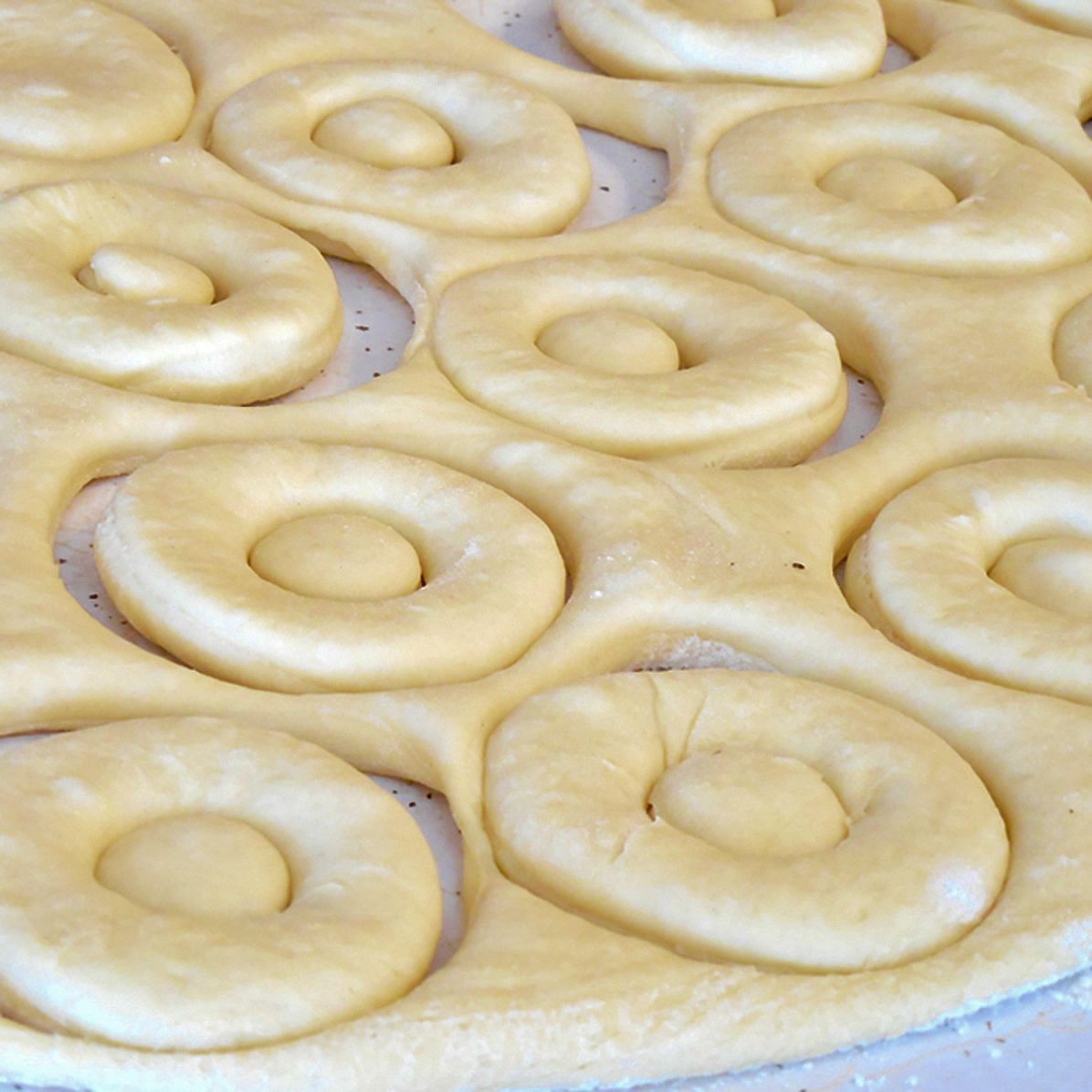 Use doughnut cutter or biscuit cutter